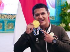 Sah! Rizki Juniansyah Catatkan Dua Rekor Dunia di Guinness World Records Dalam SEA Games edisi ke-33 itu Rizki memecahkan rekor dunia clean and jerk dan total angkatan. Ia memecahkan rekornya sendiri yang tercipat dalam Olimpiade 2024. Dalam pertandingan di Chonburi Sports School, Chonburi pada 15 Desember, lifter 22 tahun itu tak tertandingi usai melakukan total angkatan seberat 365 kilogram. (Foto: Muchlis Jr - BPMI Sekretariat Presiden)