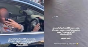 Viral Oknum Polisi AKBP Merokok Saat Berkendara Tanpa Sabuk, Akhirnya Minta Maaf Tangkapan layar polisi di Banjarmasin berpangkat AKBP yang tepergok menyetir sambil merokok dan tak pakai sabuk pengamanan. Humas Polda Kalsel mengaku telah menindaklanjuti.
