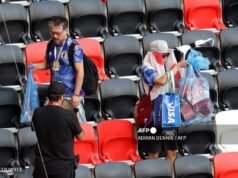 Suporter Jepang Kembali Curi Perhatian di Piala Dunia 2026, Bersihkan Stadion Usai Laga Kontra Belanda Ilustrasi Suporter Jepang bersih-bersih stadiun setelah pertandingan Piala Dunia 2026(AFP/ ADRIAN DENNIS)