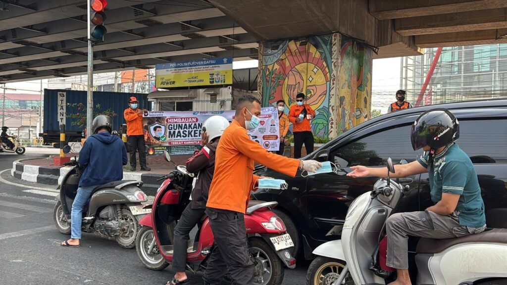 Masker Dibagikan untuk Lindungi Warga dari Paparan Asap Karhutla. Foto Dok Istimewa