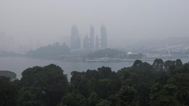 Kabut asap di Singapura. Foto: REUTERS/SUHAIMI ABDULLAH Kabut asap di Singapura. Foto: REUTERS/SUHAIMI ABDULLAH
